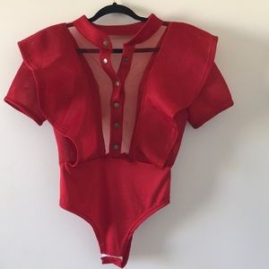STAND OUT!!!! in this sexy meshed body suit.